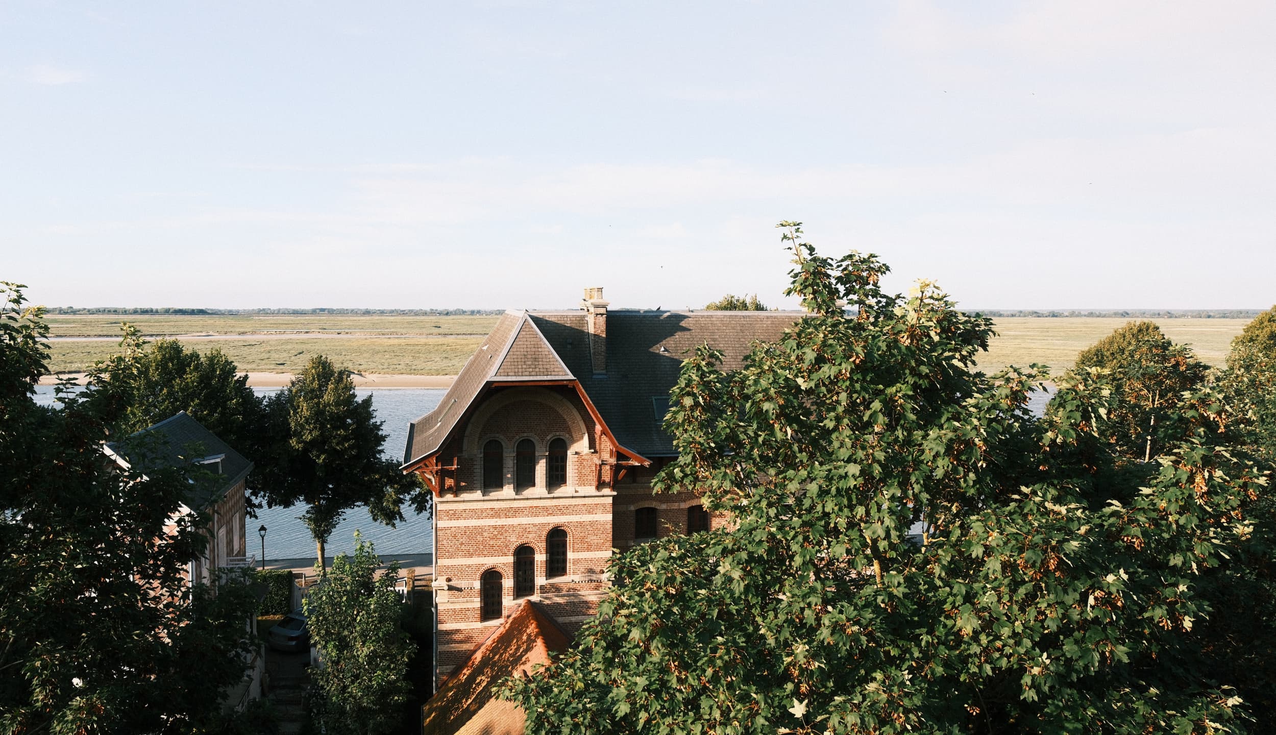 Traditional house in Saint-Valery-sur-Somme, view of the bay from the church square